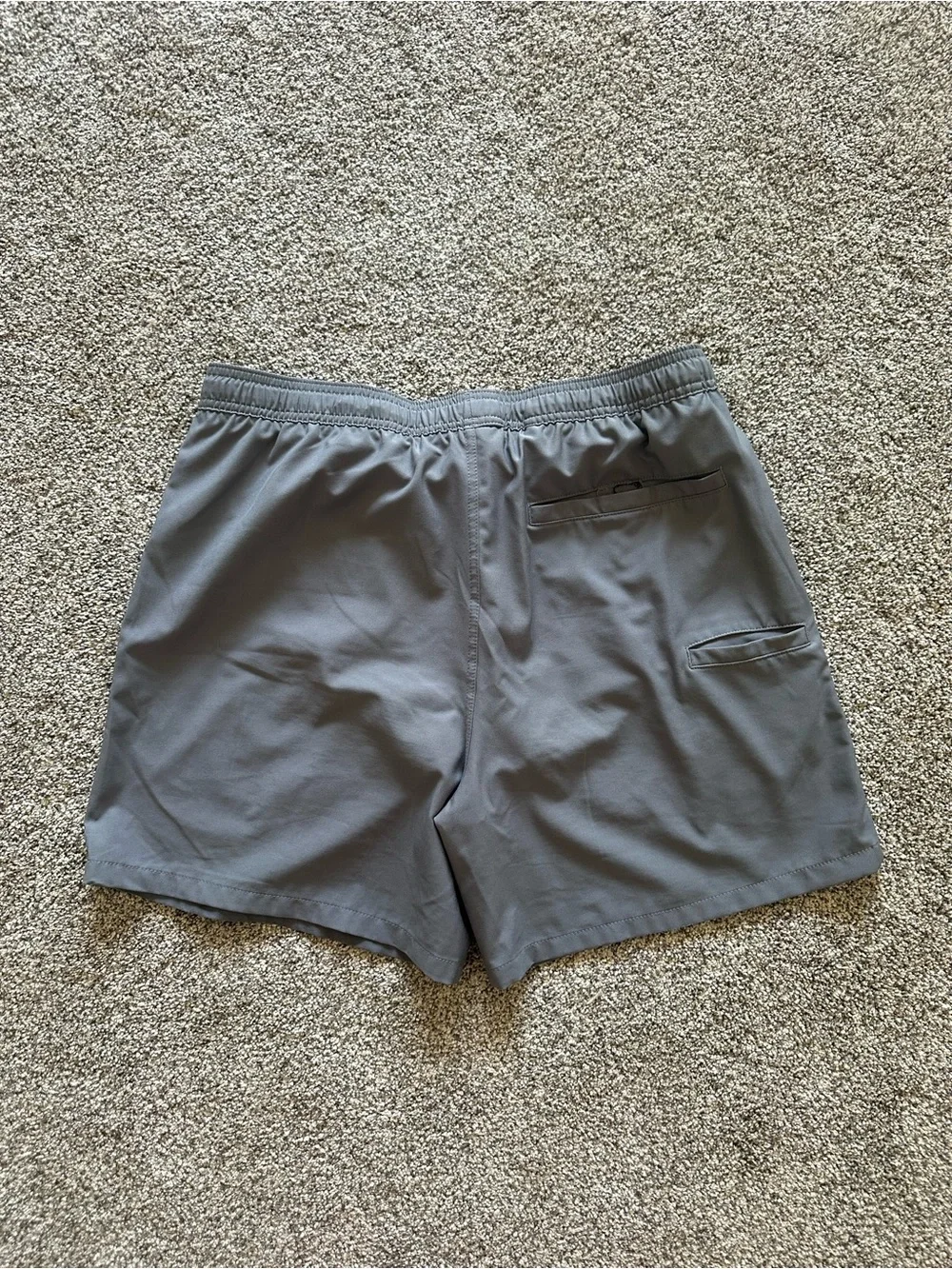 Huk Light Gray Swim Shorts with Black Logo Tag